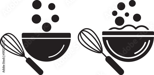 Mixing bowl with whisk and ingredients on white