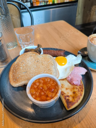 Traditional English breakfast served in a cafe in Manchester, United Kingdom.