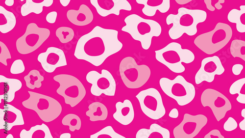 A vibrant pink background featuring an abstract leopard print pattern