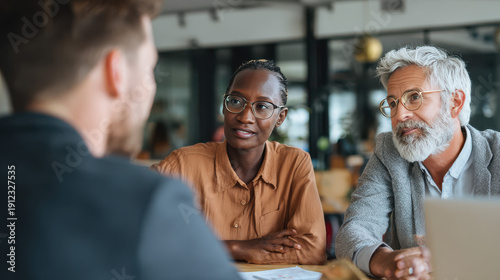 Diverse Team Collaboration: Mature Professionals Working Together for Growth and Customer Care