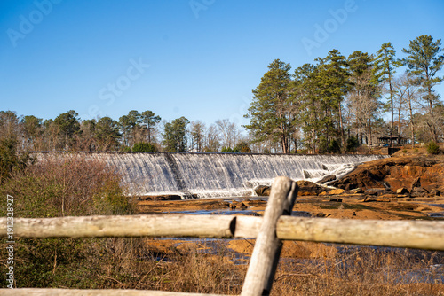 Sweetwater, Tennessee - February 10, 2026: A wide-angle view of High Falls, where water cascades over a historic dam structure