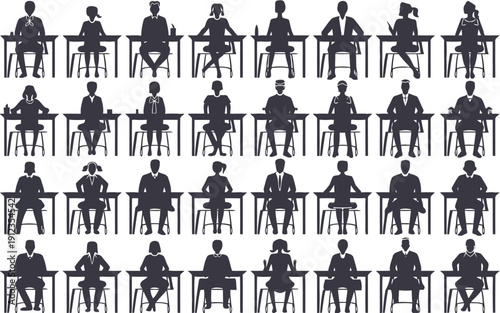 Audience members seated attentively in a uniformly arranged hall setting