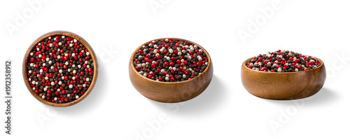 Three piles of mixed black, red and white peppercorn in a wooden bowl, shown from top and side views, isolated on a transparent background. Ideal for food design, packaging and culinary concepts.