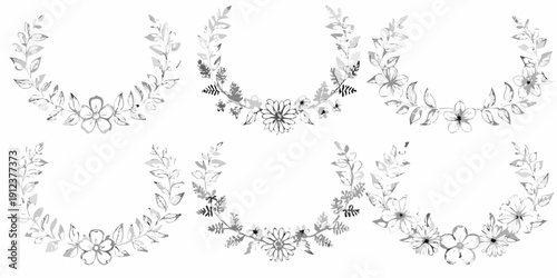 Floral wreaths and branches arranged in a delicate botanical composition