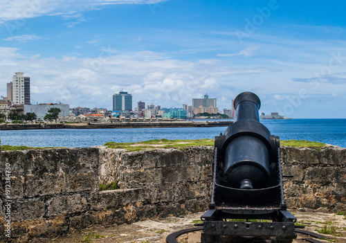 A single cannon guards the shore in Cuba.