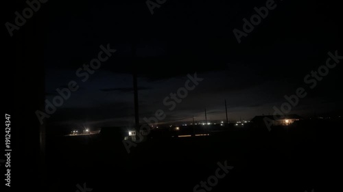 Quiet Night View of Distant City Lights from a Quiet Rural Landscape