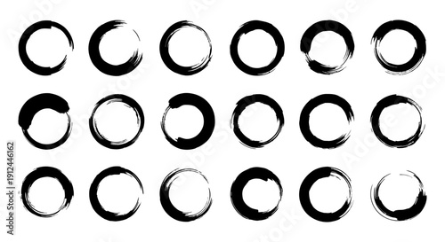 black grunge brushstroke circles and enso rings textured ink patterns on white background versatile graphic design elements for modern branding.