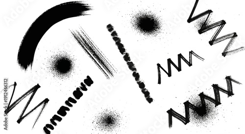 black ink brush strokes and grunge paint splatters creating abstract textures on white perfect graphic design resource.