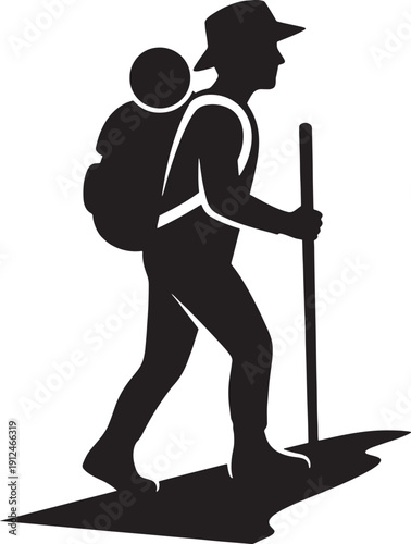 Hiker with child on back walking nature trail with trekking pole