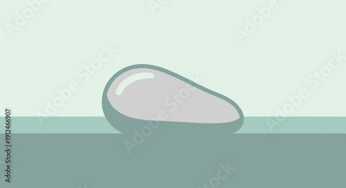 Isolated avocado pit on a plain background