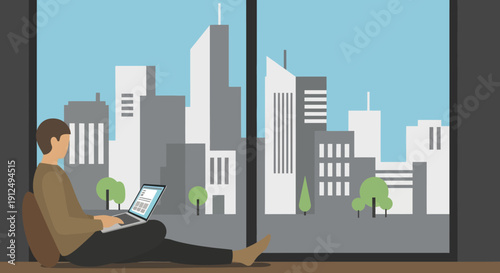 Man Sitting on Floor with Laptop.