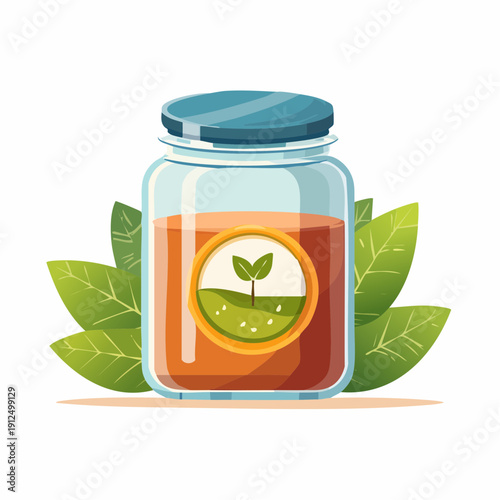 A transparent glass jar filled with tea leaves and a sprouting seed, surrounded by lush green leaves, viewed from the side