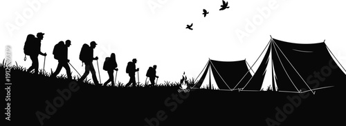 Black silhouette of hikers with backpacks walking towards a campsite with tents and campfire under birds flying in the sky