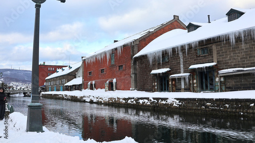 The Romantic Winter Snowscape of the Historic Otaru Canal in Hokkaido.