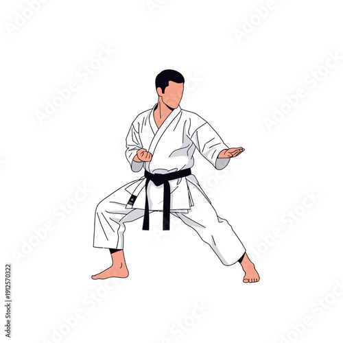 Karate practitioner in white gi and black belt performing a defensive stance