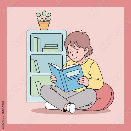 Young girl reading a book sitting on a beanbag chair next to a bookshelf