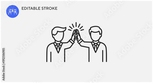 Two businessmen giving each other a high five in celebration.