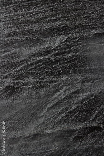 Dark grey black slate background or texture.