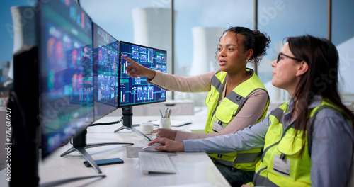 Canvas-taulu Young African American Woman Monitors Nuclear Plant