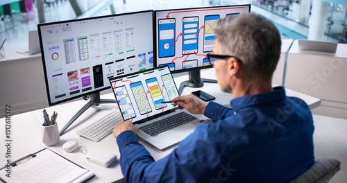 Obraz w ramie Skilled Website Designer Crafting User-Friendly Interface