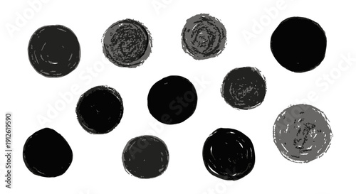 hand drawn abstract circles with grunge texture in black and gray on a white background ideal graphic design elements.