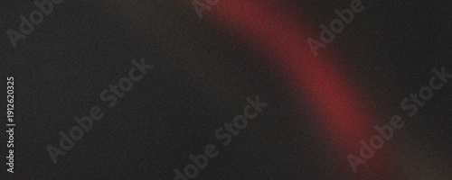 Tableau sur toile Deep red light leak on grainy dark background for cinematic overlays