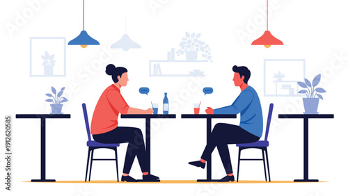 Young man and woman sitting at a table in a cozy cafe and having a conversation during a romantic date or friendly meeting.