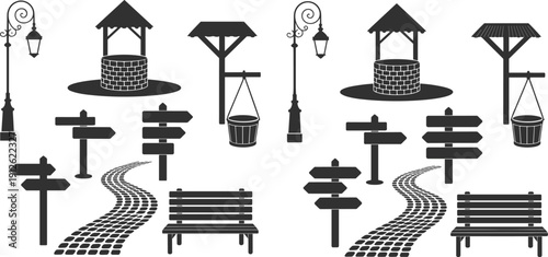 Black and white of well bucket street lamp signpost bench and road