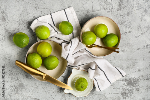 Bowls with fresh ripe limes...