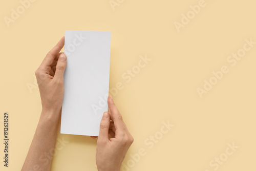 Female hands with blank car...