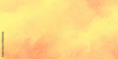Abstract orange and yellow watercolor background texture includes artistic paint splatters, subtle paper grain, and soft transitions.