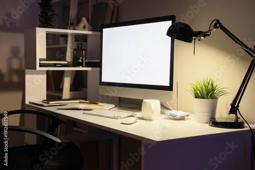Workplace with blank comput...