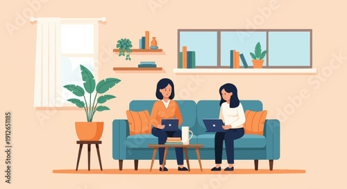 Two women working on laptops while sitting on a sofa in a cozy room