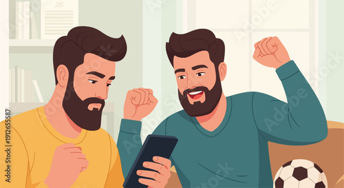 Two excited men watching a game on a phone with a soccer ball nearby