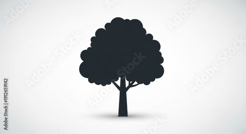 Silhouette of a single tree with a full canopy against a plain white background symbolizing nature and simplicity