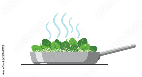 Healthy green leafy vegetables gently steaming in a contemporary kitchen pan preparing a nutritious meal
