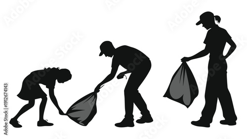 Three figures in black appearing to collect trash presented as a striking silhouette high quality professional