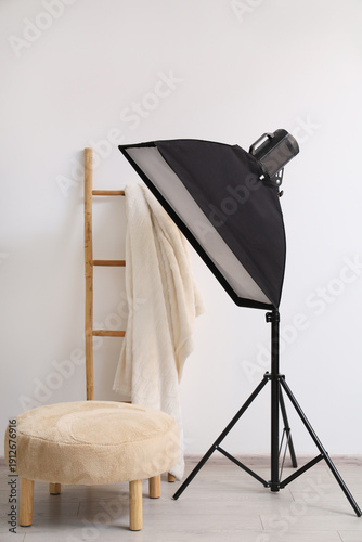 Modern photo studio with po...
