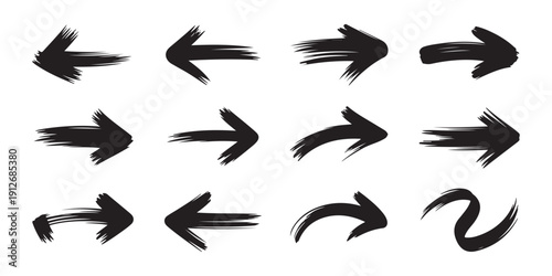 Collection of hand painted brush stroke arrows in black showing different directions and curves