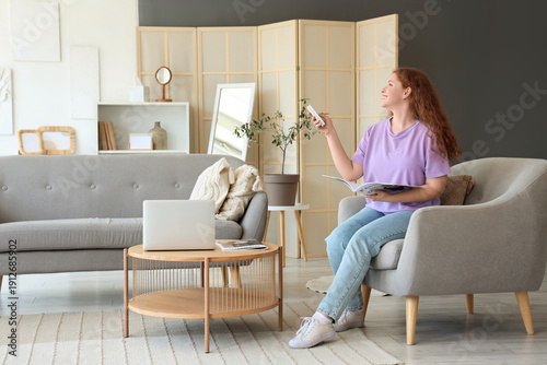 Young woman with air condit...