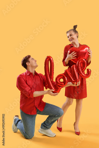 Young couple with word LOVE...