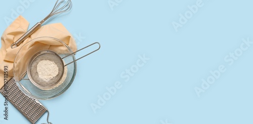 Metal sieve with flour in b...