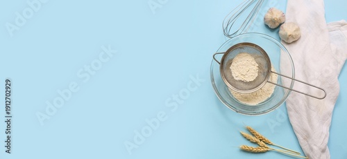 Metal sieve with flour in b...