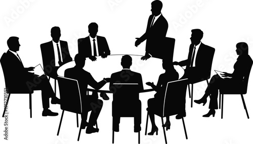 Black silhouette of business professionals in a corporate meeting sitting around a round table for a group discussion and collaboration