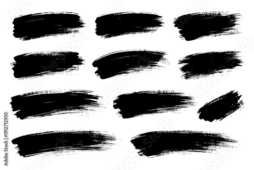 Grunge style black brush stroke set on white background.