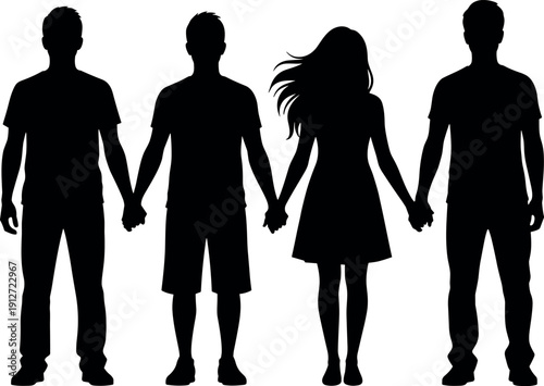 Group of four young people standing together holding hands in silhouette showing concept of friendship unity community diversity and teamwork