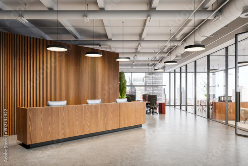 Bild auf Leinwand Contemporary office interior with wooden reception desk and open workspace design featuring floor-to-ceiling windows and ceiling ductwork