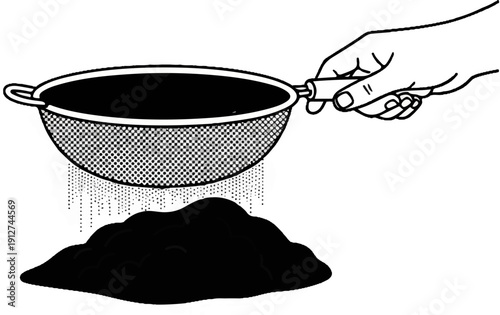 A hand holds a sieve, sifting dark material onto a pile below