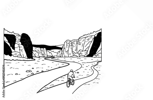 A person bikes through a scenic canyon with winding paths and rocky cliffs