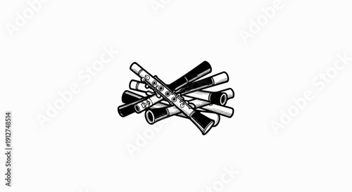 A pile of black and white woodwind instruments, including clarinets